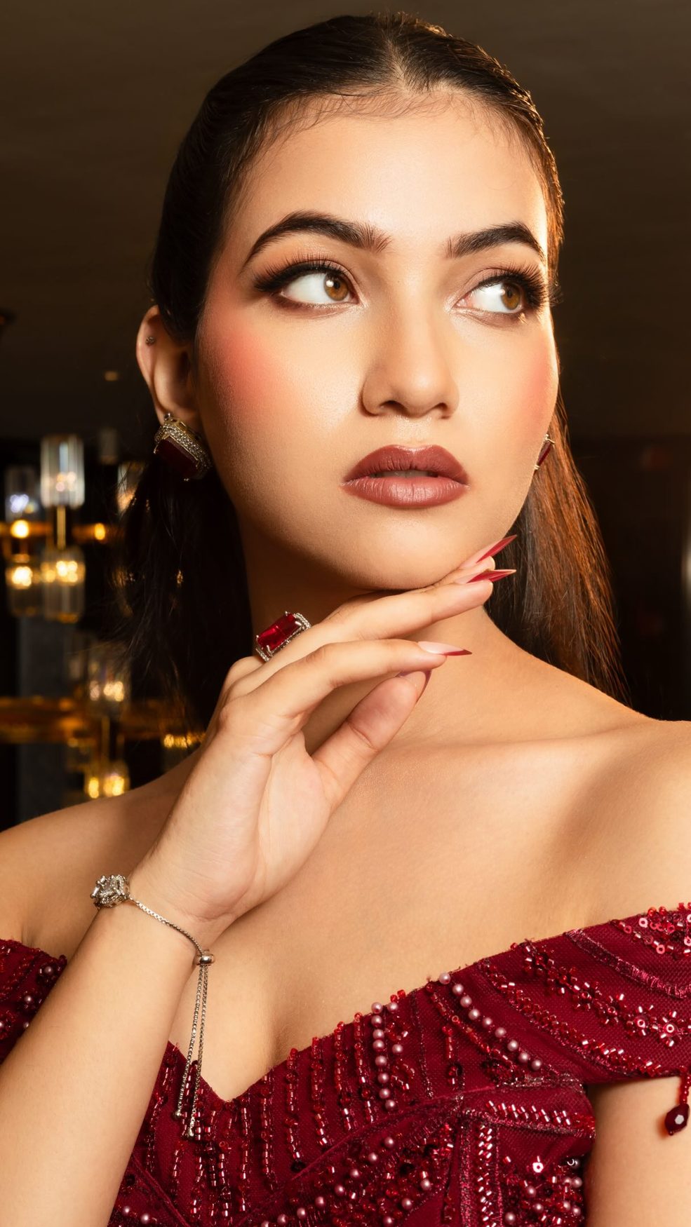 Soft glam makeup with sleek hair