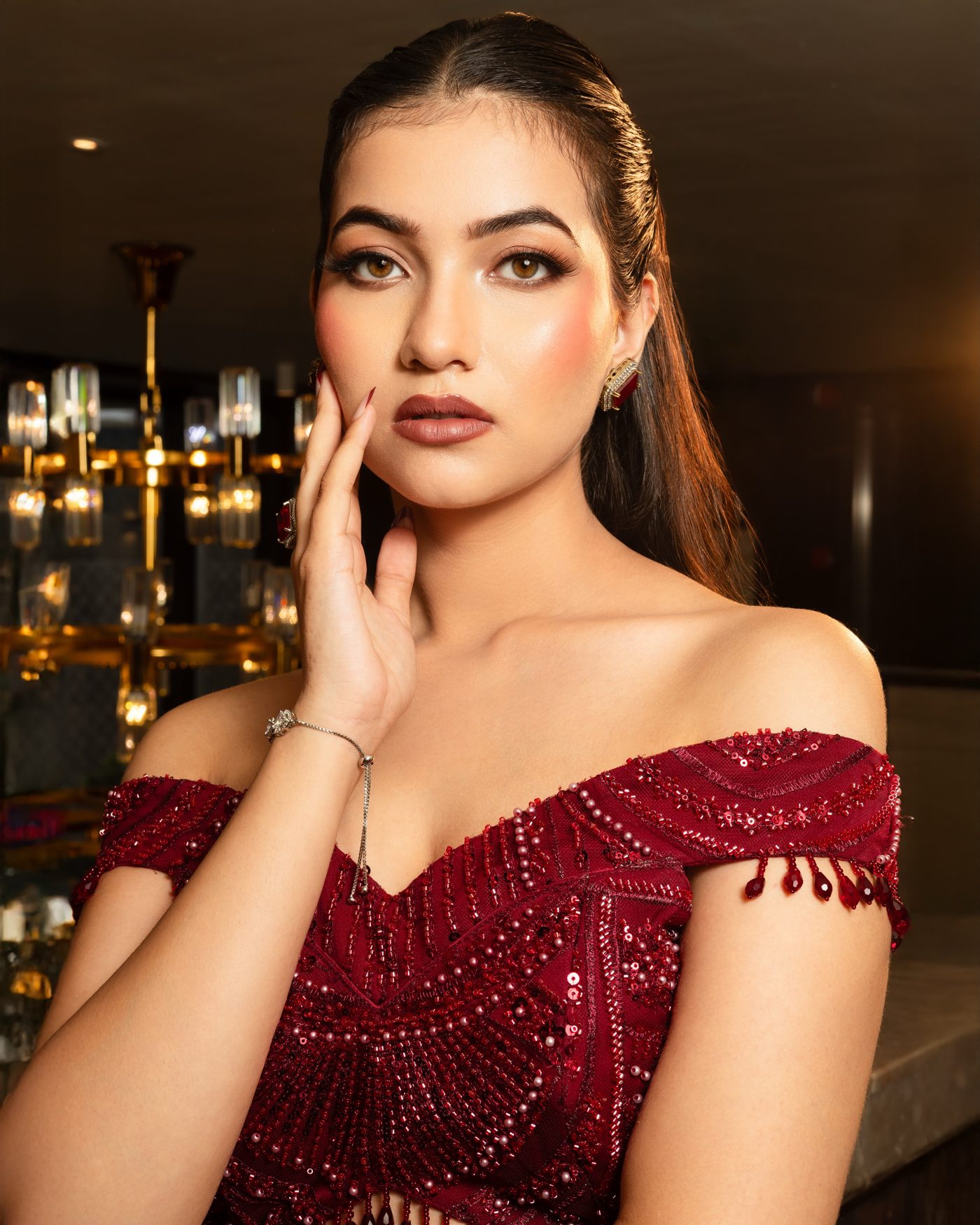 Glam makeup by Sharin Balwani — berry off-shoulder look